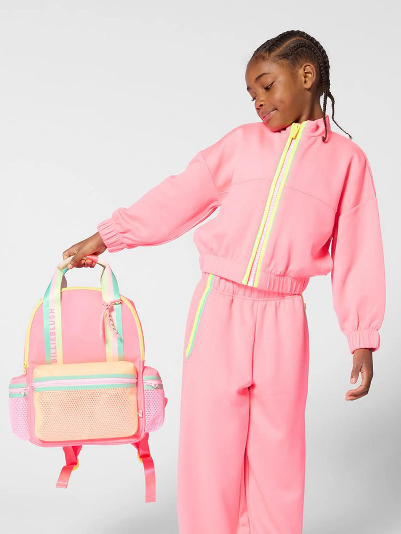Girl modelling the Billieblush jacket.