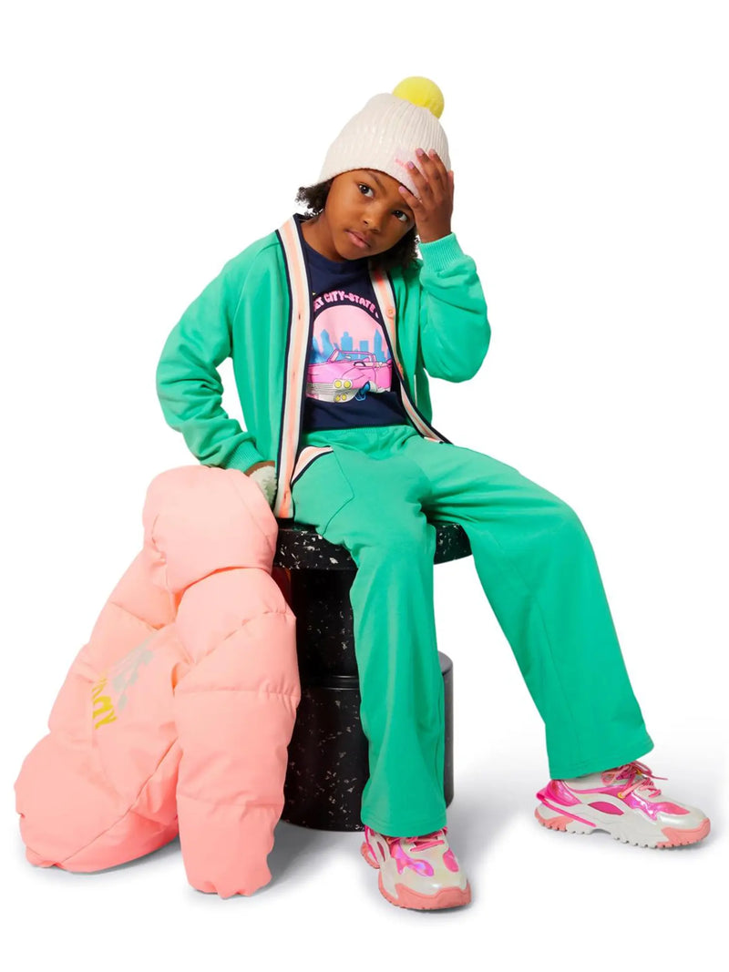 Girl wearing the Billieblush track bottoms.