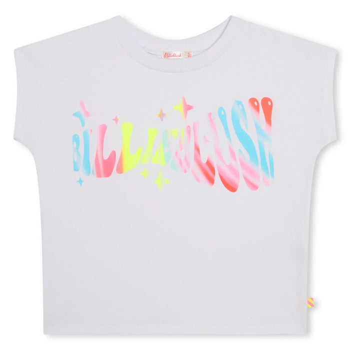 White t-shirt with psychedelic Billieblush logo. 