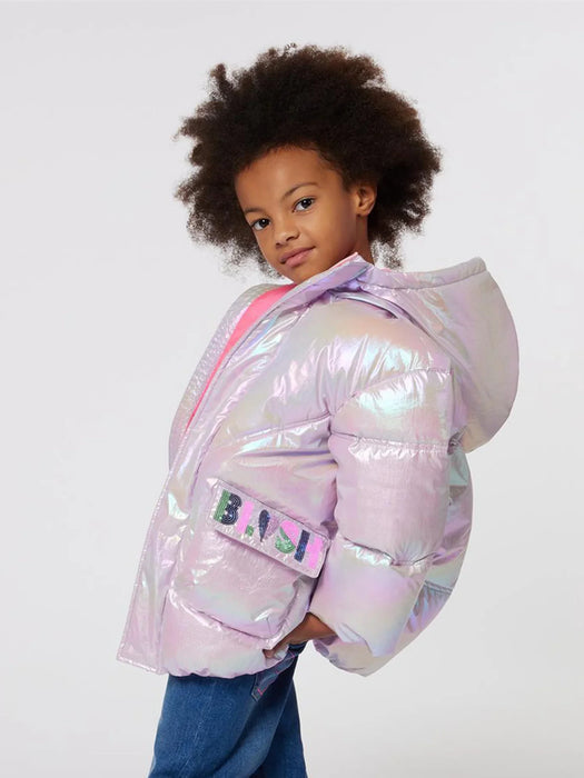 Girl modelling the Billieblush puffer jacket.