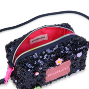Billieblush sequin bag with bright pink inner lining.