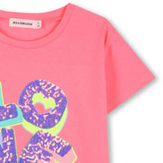 Closer look at the Billieblush sequin t-shirt showing detail of the sequin love slogan.