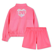 Rear view of the Billieblush pink shorts set.