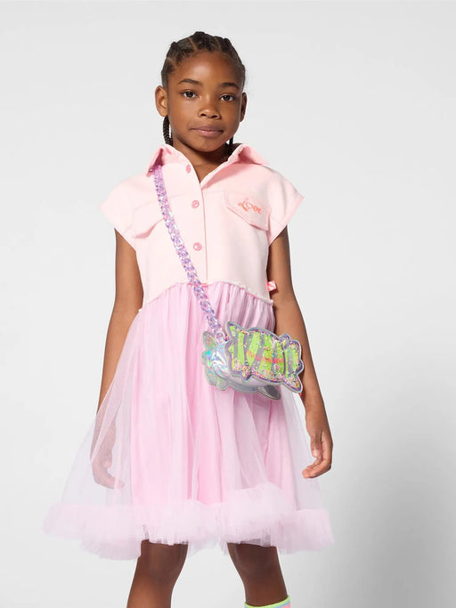 Girl in pink sleeveless dress by Billieblush.