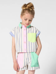 Girl modelling the Billieblush striped shirt.