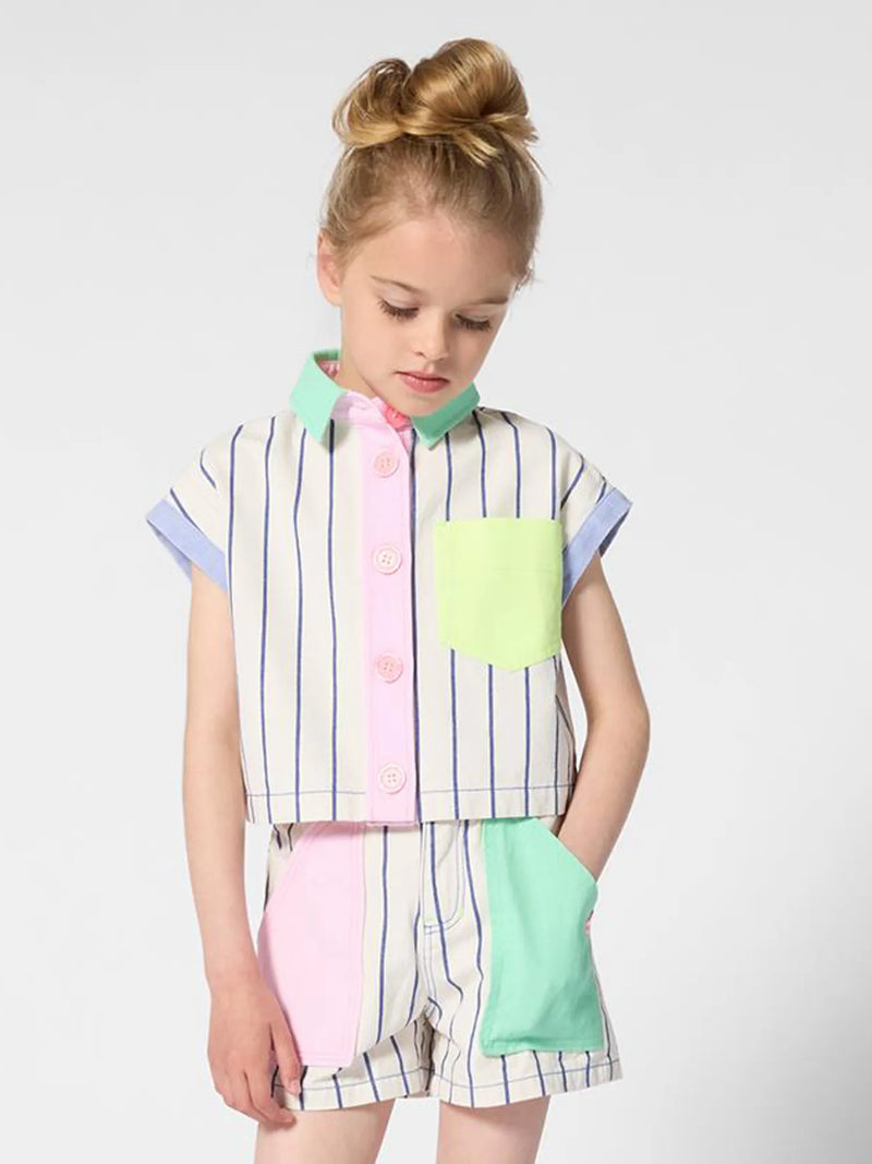 Girl modelling the Billieblush striped shirt.