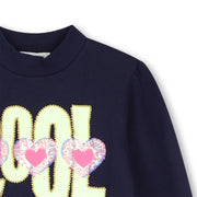 Closer view of the Billieblush sweatshirt.