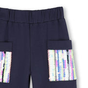 Closer look at the Billieblush track bottoms showing detail of the sparkling sequins on the pockets.