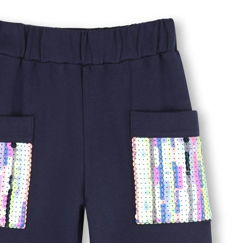 Closer look at the Billieblush track bottoms showing detail of the sparkling sequins on the pockets.