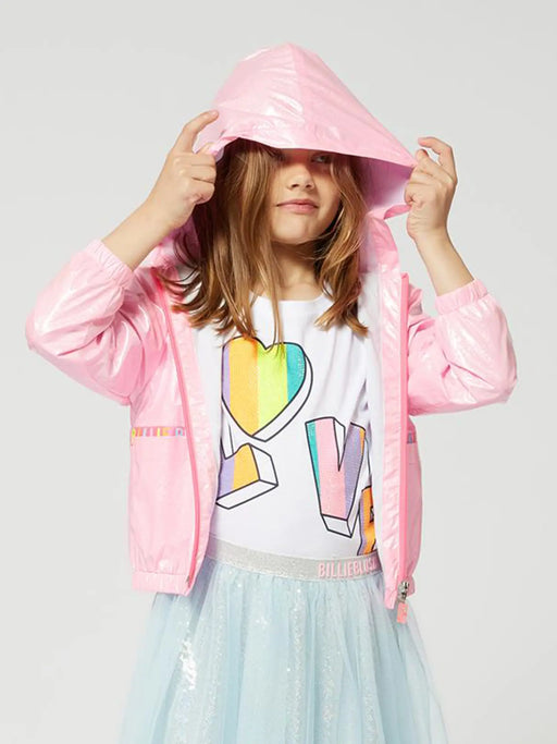 Girl modelling the Billieblush windbreaker.