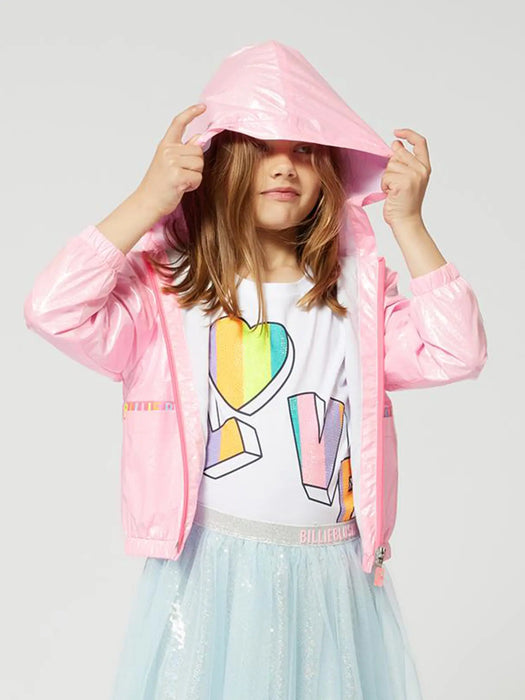 Girl modelling the Billieblush windbreaker.