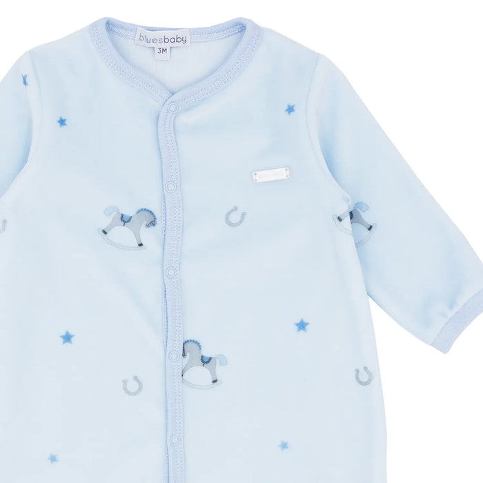 Blues Baby babygrow & hat with rocking horse pattern.