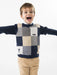 Boy modelling the Boboli checkerboard jumper.