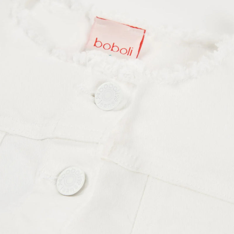 Closer look at the Boboli denim jacket showing detail of the frayed trim along the collar.