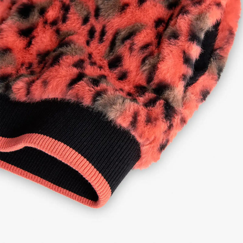 Closer look at the Boboli faux fur jacket showing detail of the navy trim