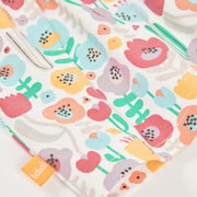 Closer look at the Boboli dress showing detail of the brightly coloured floral pattern.