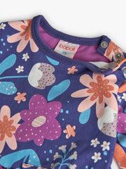 Closer look at the Boboli long sleeve print dress showing detail of the funky floral print