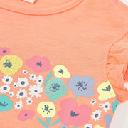 Closer look at the Boboli orange t-shirt showing detail of the colourful flower print.