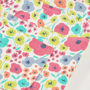 Boboli white shorts with brightly coloured floral pattern.