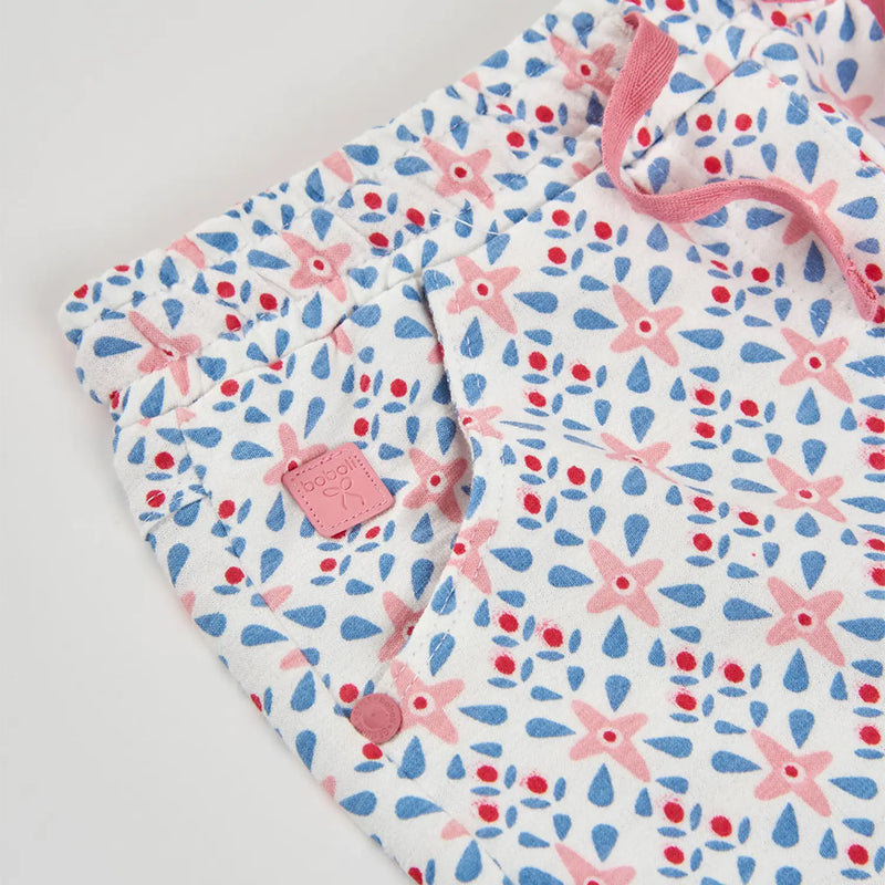 Closer look at the Boboli track shorts showing detail of the vintage floral pattern.