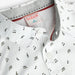 Boboli printed shirt with a pattern of musical notes.