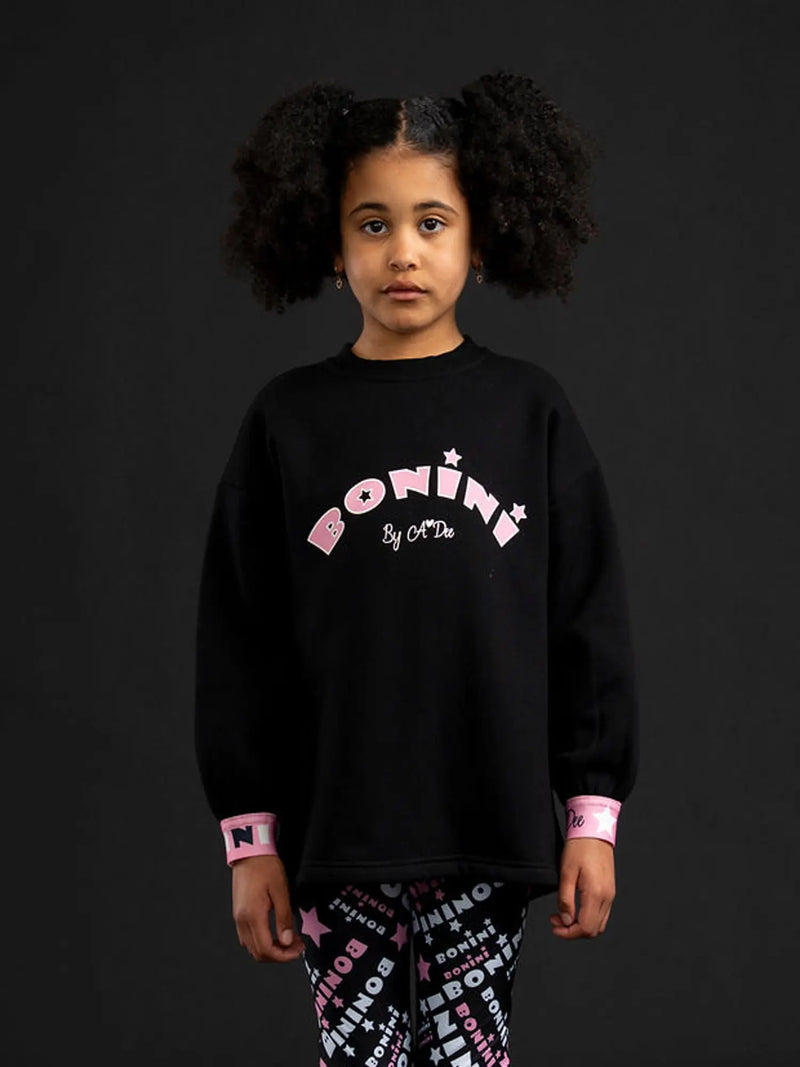 Girl modelling the Bonini groove sweatshirt.