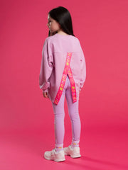 Closer look at the Bonini groove sweatshirt showing detail of the split back hem.