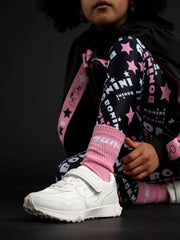 Girl wearing the Bonini twirl socks.