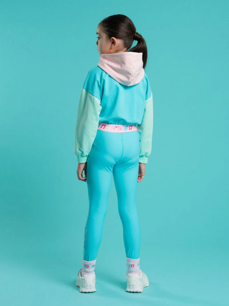 Girl wearing the Bonini vibe hoodie.