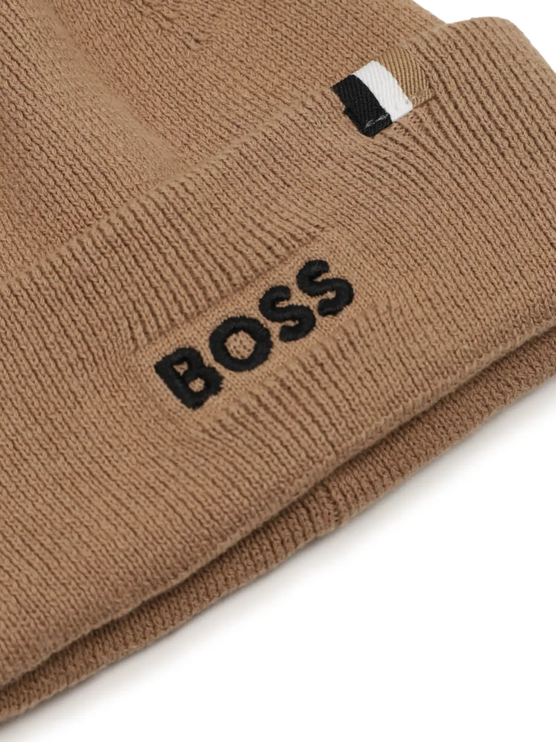 Closer look at the BOSS bobble hat showing detail of the embroidered logo.