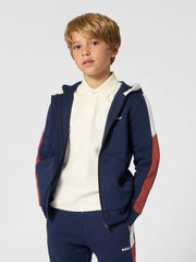 Boy wearing the BOSS zip up hoodie.
