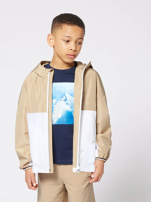 Boy modelling the BOSS colourblock jacket.