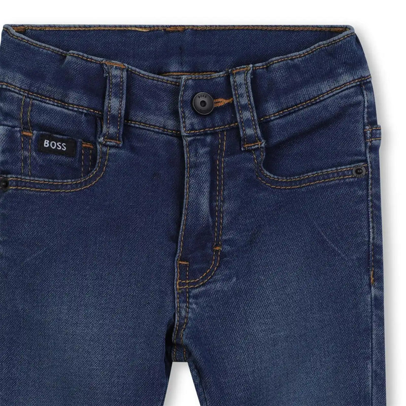 Closer view of the BOSS turn up jeans.