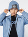 Boy wearing the blue boss logo hat. 