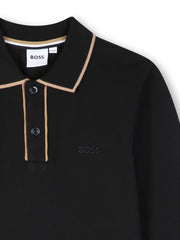 Closer look at the BOSS long sleeve polo shirt showing detail of the tonal logo.