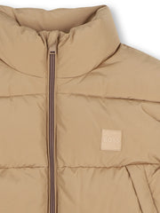 Closer look at the BOSS padded gilet showing detail of the square logo patch on the chest.