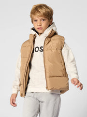 Boy wearing the BOSS padded gilet.