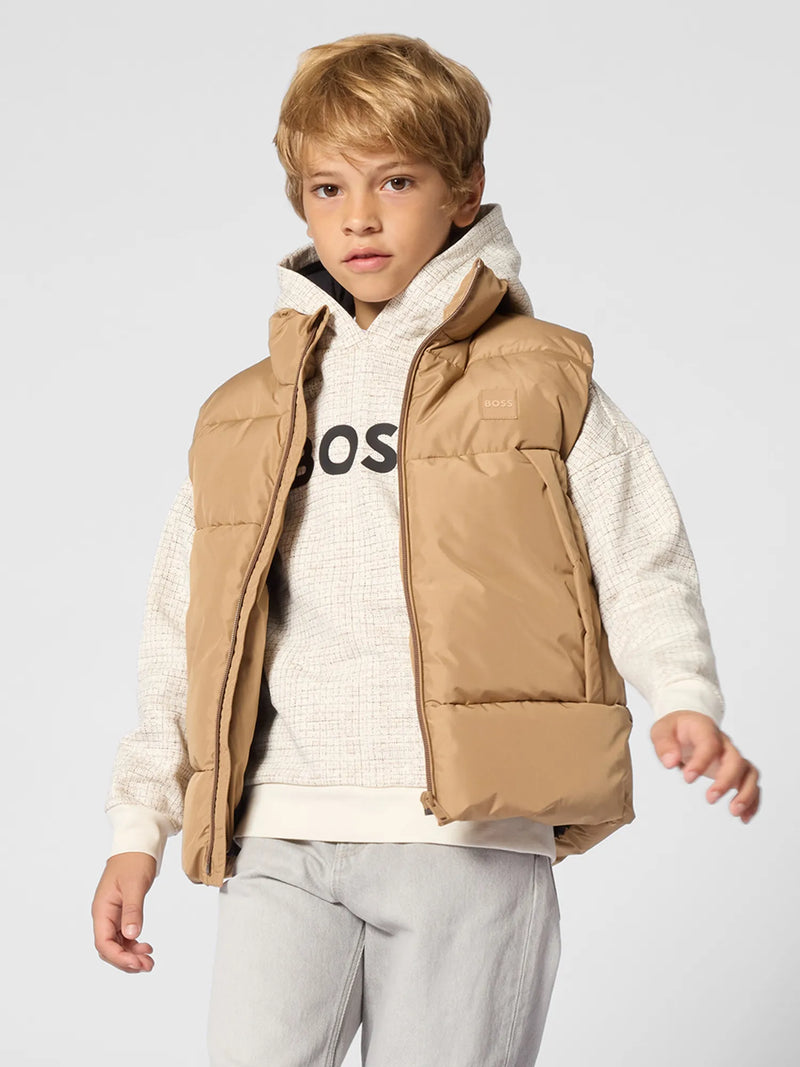 Boy wearing the BOSS padded gilet.
