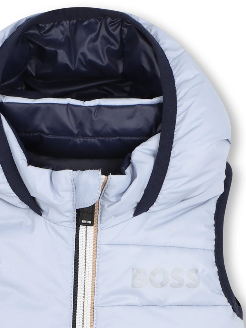 Closer look at the BOSS reversible gilet showing detail of the navy trim.