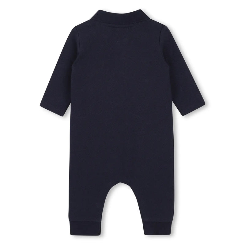 Rear view of the BOSS navy romper.