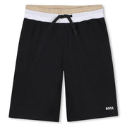 Boy's black BOSS track shorts.