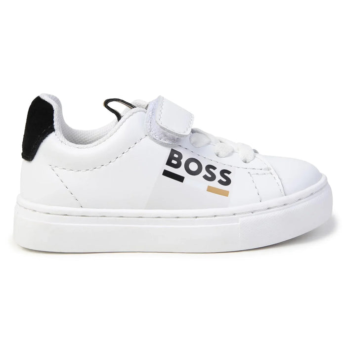 Side view of the BOSS white trainers.