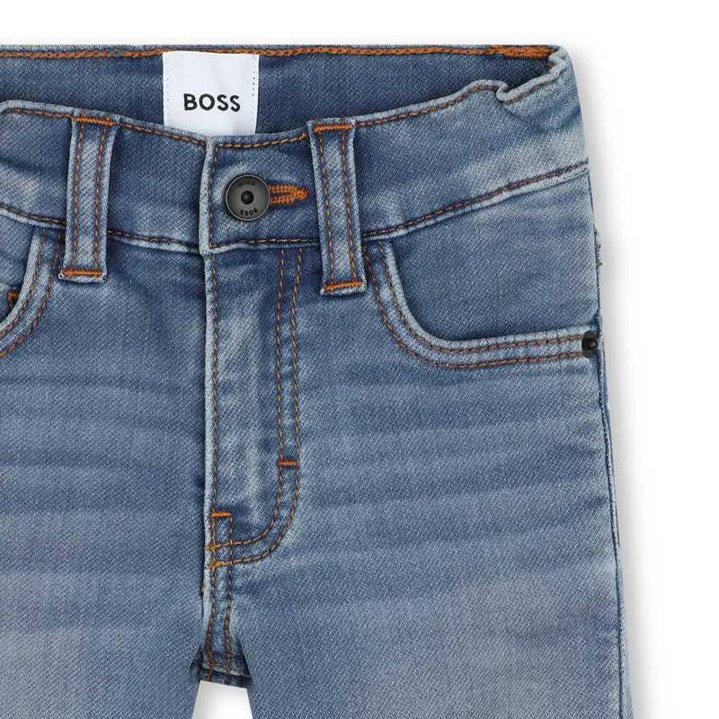 Closer view of the BOSS turn up jeans.