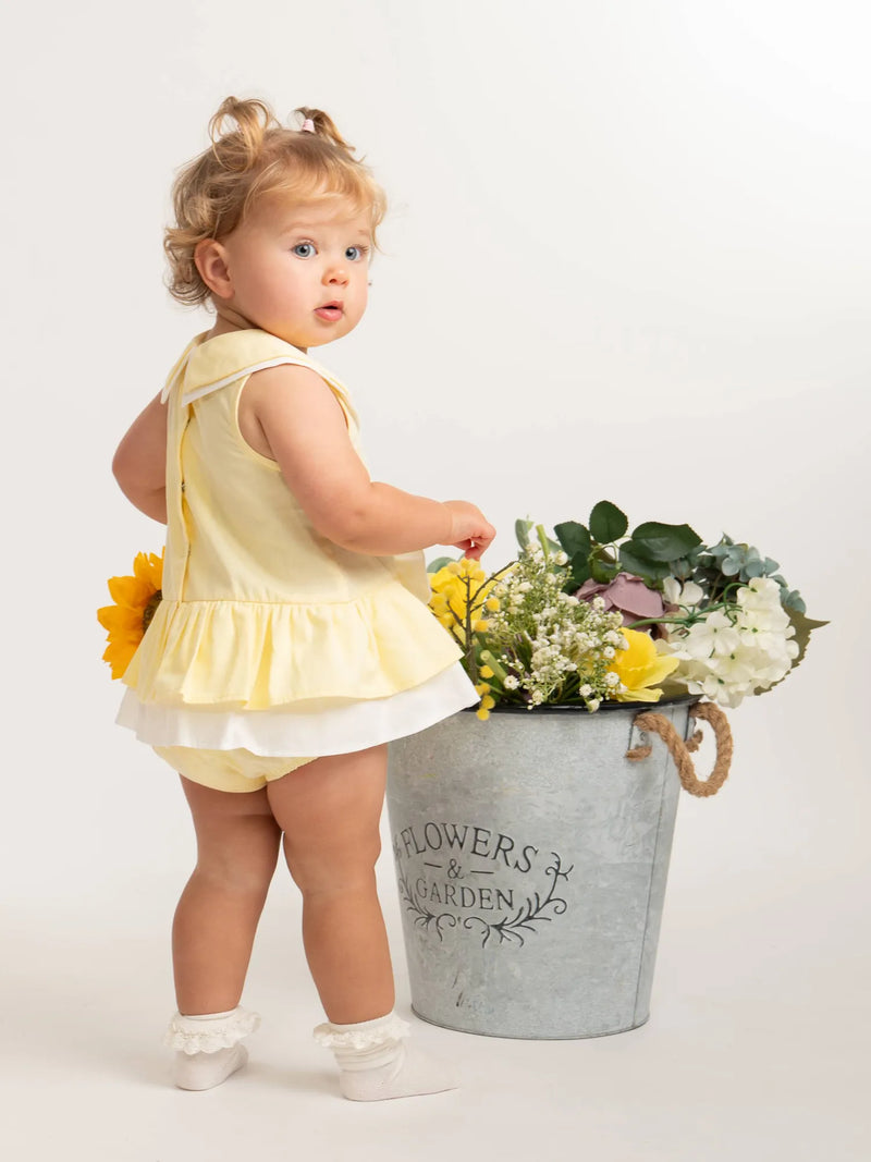 Rear view of the Caramelo bow dress.