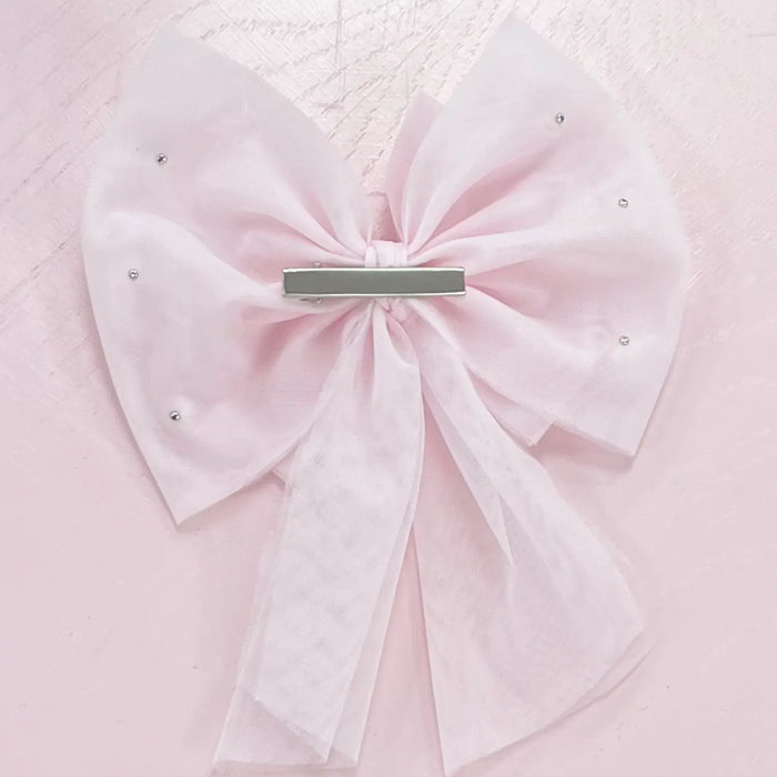 Back of the Caramelo pink pearl hair bow.