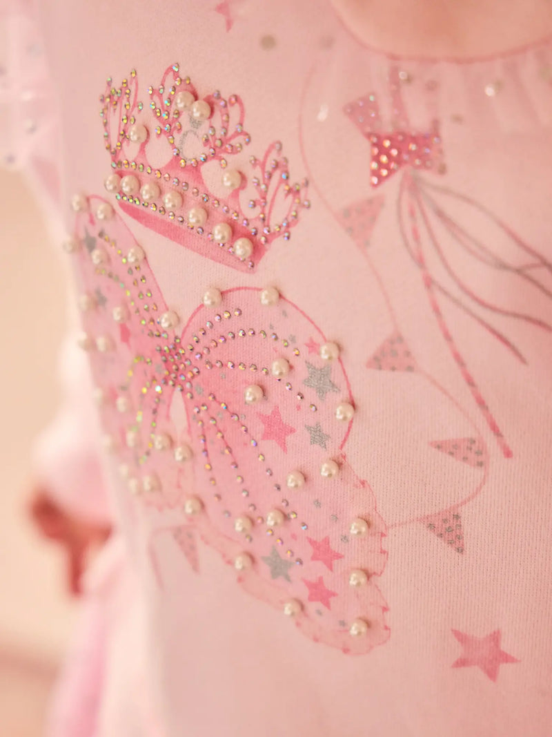 Caramelo royal magic dress with royal themed print.