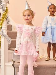 Girl modelling the Caramelo royal magic leggings set.