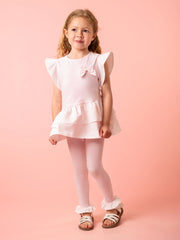 Girl wearing the Caramelo striped leggings set.