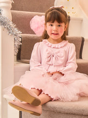 Girl modelling the Caramelo tulle dress.