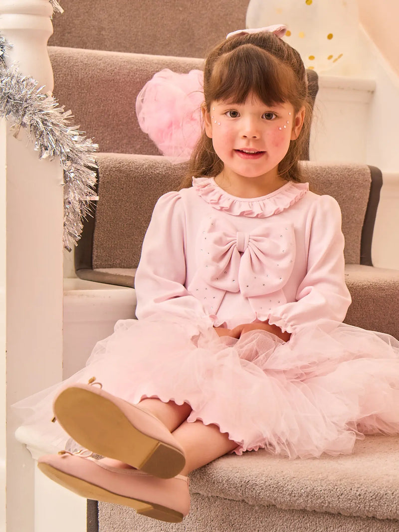 Girl modelling the Caramelo tulle dress.